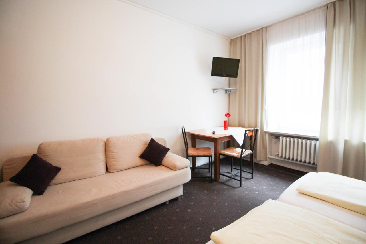 Hotel Pension Am Hauptbahnhof Мюнхен Номер фото